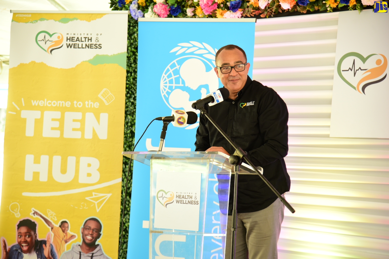 Minister of Health and Wellness, Dr. the Hon. Christopher Tufton, delivers the main address at the official opening of the St. Thomas Teen Hub at the Morant Bay Bus Park on June 9. 