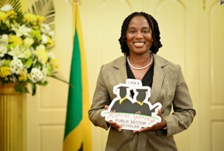 Top 2023 recipient of the Marcus Garvey Public Sector Scholarship, Captain Natalie James. She is among 19 public-sector employees who have been awarded scholarships to pursue master’s or doctoral studies at an approved local and or international university.