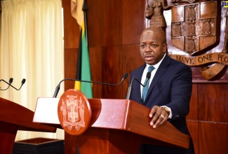 Minister of Labour and Social Security, Hon. Pearnel Charles Jr., addressing Wednesday’s (June 21) post-Cabinet press briefing at Jamaican House.