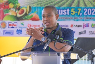 Minister of Agriculture, Fisheries and Mining, Hon. Floyd Green, addressing the recent Denbigh Agricultural, Industrial, and Food Show at the Denbigh Showground in Clarendon.