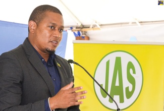 Minister of Agriculture, Fisheries and Mining, Hon. Floyd Green, addresses the launch of the Denbigh Agricultural, Industrial and Food Show today (June 21), at the Hi-Pro supercentre in St. Catherine.