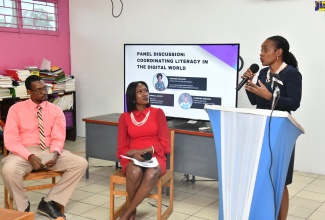 Minister of State in the Ministry of Education and Youth, Hon. Marsha Smith (right), addresses the launch of a digital library at the Jessie Ripoll Primary School in Kingston on August 26. Also pictured are (from left)  Director of the school’s Alumni Association, Joneil J. Alcock and Social Development Practitioner and NexxStepp Lifelong Educational Services Founder and Manager, Tishauna Mullings.