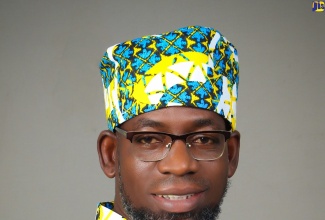Veteran journalist and Chairman of the Kitson Town Civic Committee, Garfield L. Angus.