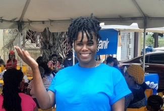 Operator of the dental department at the NADS Family Health Care in St. Catherine, Dr. Simone Brady, at the community health fair, held at the Green Acres Commercial Business Complex in the parish, on August 13.