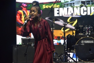 Little Ngozi Wright performs a dub poem during the Emancipation Jubilee at the Seville Heritage Park in St. Ann on Monday (July 31).