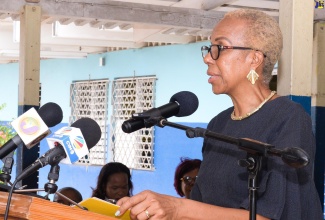 Minister of Education and Youth, Hon. Fayval Williams, speaks at a special devotion held in acknowledgement of the National Day of Mourning for Jamaica’s Children, at the Braeton Primary and Infant School in St. Catherine, on Friday (June 23).
