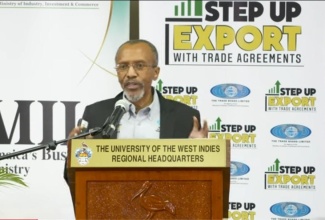 Director of Information Systems and Records Management at the Trade Board Limited, Carl Morgan, presents on the findings of the entity’s ‘Step-Up Export with Trade Agreements’ project, at a seminar held at the University of the West Indies (UWI) Regional Headquarters in Kingston, on May 16.