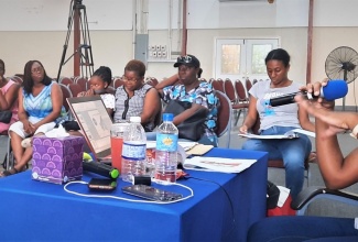 Field Officer from the Ministry of Justice’s Justice Centre in Montego Bay, St. James, Moesha Williams, engages participants from the Lighthouse of Faith Ministries International, who recently benefited from a two-day training session in Restorative Justice. The session was facilitated under a Memorandum of Understanding (MOU) between the Ministry and leaders of 13 umbrella group of churches in September 2022, for the training of the faith-based community to empower citizens in Restorative Justice practices.
