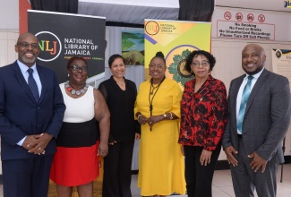 Minister of Culture, Gender, Entertainment and Sport, Hon. Olivia Grange (fourth left) attends the ‘World Poetry Day: Jamaica 60’ celebration held on Tuesday (March 2, 2023) at the Little Theatre, 4 Tom Redcam Drive in Kingston. She is joined by (from left) Advisor, Communications and Information, United Nations Educational Scientific and Cultural Organization (UNESCO) Caribbean Office, Dr. Paul Hector; National Librarian, National Library of Jamaica (NLJ), Beverley Lashley; Organization of American States (OAS) Representative to Jamaica, Jeanelle Van Glaanen Weygel; Chairman, Board of Management, NLJ, Joy Douglas; and Executive Director of the Institute of Jamaica (IOJ), Leslie Harrow.