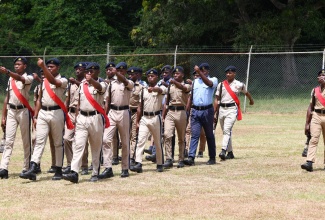 Members of the Jamaica Combined Cadet Force (JCCF) perform a drill during the Caribbean Cadet Camp exhibition held at Clarendon College on Sunday (July 23).
