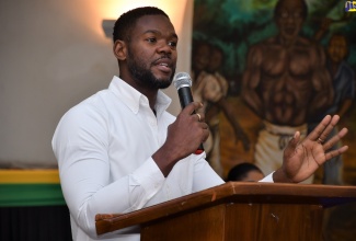 Deputy Mayor of Montego Bay, Councillor Richard Vernon, addresses parents at the St James Municipal Corporation’s annual back-to-school education support presentation at the Montego Bay Cultural Centre, Sam Sharpe Square, on Wednesday (August 23).