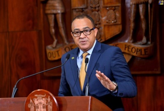Minister of Health and Wellness, Dr. the Hon. Christopher Tufton, responds to a question during the recent post-Cabinet press briefing at Jamaica House in St. Andrew.