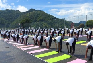 Jamaica Defence Force (JDF) personnel participate in a yoga session at the Newcastle Military Camp in St Andrew.