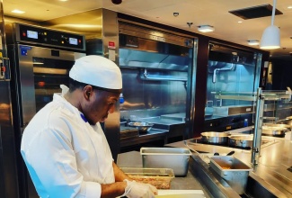 Junior Executive Chef, Javann Riley, does meal prep aboard Virgin Voyages’ Resilient Lady cruise vessel. The 25-year-old from Tower Hill lane in Olympic Gardens, Kingston, received his culinary certification through the HEART/NSTA Trust.