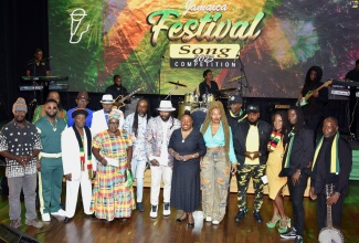 Minister of Culture, Gender, Entertainment and Sport, Hon. Olivia Grange (centre), is flanked by contestants in the 2023 Jamaica Festival Song Competition, at the presentation show held at the Courtleigh Auditorium in New Kingston on July 6.