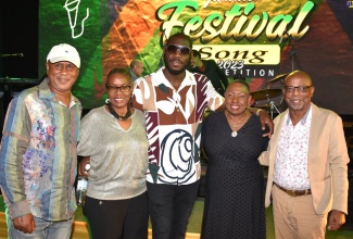 Minister of Culture, Gender, Entertainment and Sport, Hon. Olivia Grange (second right), with the judges for the 2023 Jamaica Festival Song Competition (from left) Roy Rayon, Pam Hall, Cardell Burrell and Clyde McKenzie. They were at the Jamaica Festival Song presentation show held at the Courtleigh Auditorium in New Kingston on July 6.