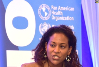 Consultant Psychiatrist, University Hospital of the West Indies, Senator Dr. Saphire Longmore addresses a graduation ceremony for the Problem Management Plus (PM+) held at the Summit in New Kingston on August 10. More than 100 PM+ providers received their certificates during the ceremony.