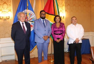 Jamaica’s Ambassador to the United States, Permanent Representative to the Organization of American States (OAS) and OAS Permanent Council Chair, Her Excellency Audrey Marks (second right), shares a photo opportunity with (from left) OAS Secretary-General, Luis Almagro; President of the Republic of the Guyana, Dr. Irfaan Ali; and OAS Assistant Secretary-General, Ambassador Nestor Mendez, ahead of the Permanent Council’s protocolary  meeting on September 15 in Washington DC. The meeting was convened in the Guyana’s leader honour.