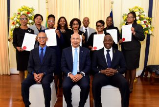 Governor-General, His Excellency the Most Hon. Sir Partick Allen (seated, centre); President of the Court of Appeal, Hon. Justice Patrick Brooks (seated left) and Chief Justice, Hon. Bryan Sykes (seated right), with members of the judiciary who were appointed to higher office at a swearing-in ceremony at King’s House, on September 18. From left are Her Hon. Tracey-Ann Johnson; Her Hon. Christine McNeil; Her Hon. Luciana Jackson; Mrs. Sharon Millwood Moore; Master Pamela Mason; Hon. Justice Kissock Laing; Master Stephany Orr; Her Hon. Opal Smith; and Hon. Justice Georgiana Fraser.
