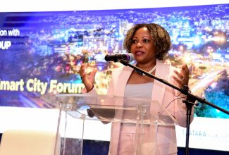 Minister without Portfolio in the Office of the Prime Minister with oversight for Skills and Digital Transformation, Senator Dr. the Hon. Dana Morris Dixon, addresses a smart city forum hosted by the Jamaica Public Service (JPS) at The Jamaica Pegasus hotel in New Kingston on September 20.