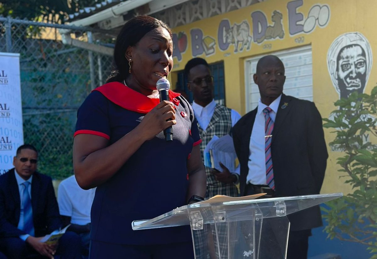 Acting Principal of the Allman Town Primary School in Kingston, Thamar Russell-Brown, speaks at the handover of a desktop computer to the school by the Universal Service Fund (USF) on September 14.

