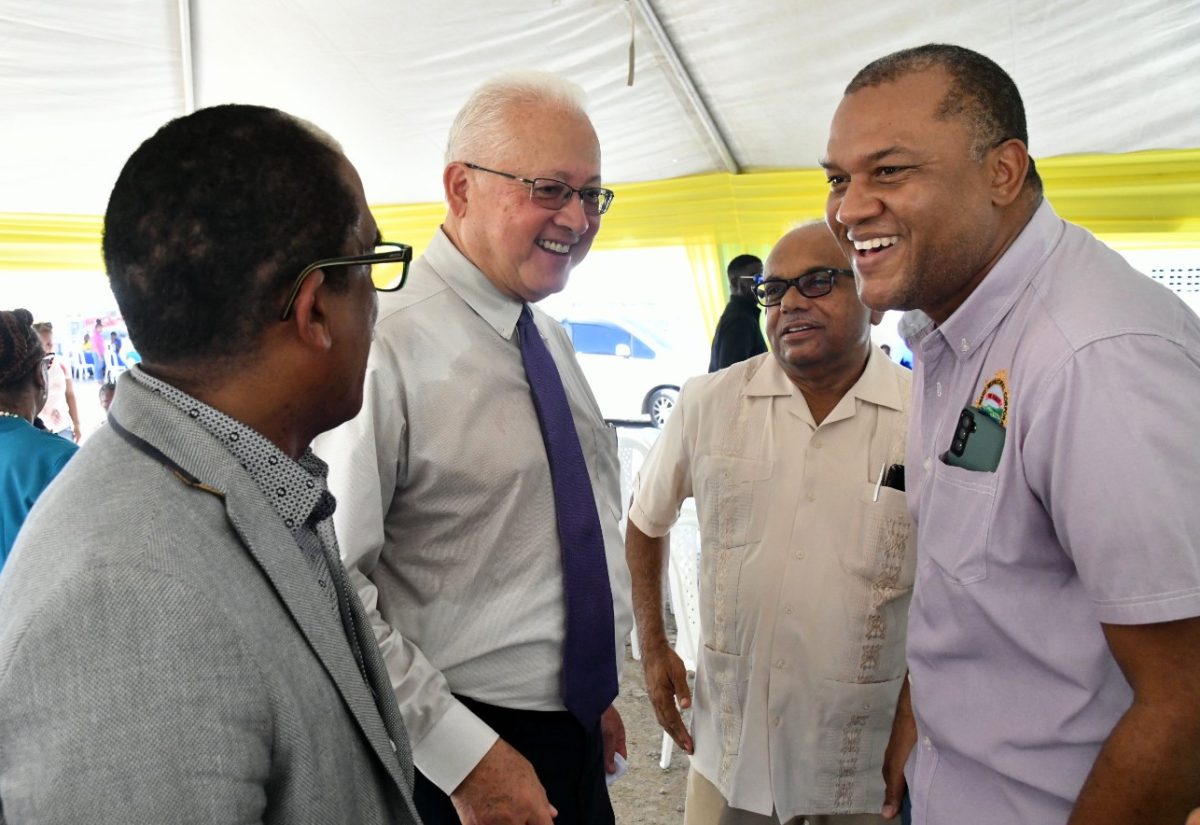 Minister of Justice, Hon. Delroy Chuck (second left), is in light conversation with (from left) State Minister in the Ministry of Local Government and Rural Development, Dr. the Hon. Norman Dunn; Custos Rotulorum of St. Mary, Errol Johnson; and Mayor of Port Maria, Richard Creary. The event was the Legal Aid Council (LAC) Justice Fair held on September 15 at the Annotto Bay Car Park, Main Street in St. Mary. The LAC Justice Fairs play an integral role in increasing access to justice services for Jamaicans.