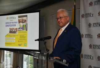 Justice Minister, Hon. Delroy Chuck, addresses Wednesday’s (September 20) Justices of the Peace (JP) sensitisation session at The Jamaica Pegasus hotel in New Kingston.

