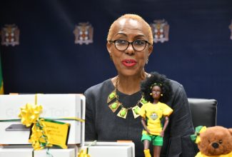 Minister of Education and Youth, Hon. Fayval Williams, delivers remarks during the handover of tablets and accessories donated by Island Dolls at the Ministry’s main office in Kingston on Wednesday (September 27).