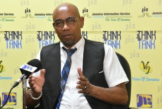 Senior Director, Inspections and Monitoring at the Police Civilian Oversight Authority (PCOA), Andrew Beaumont, emphasises a point while addressing a JIS Think on September 6.