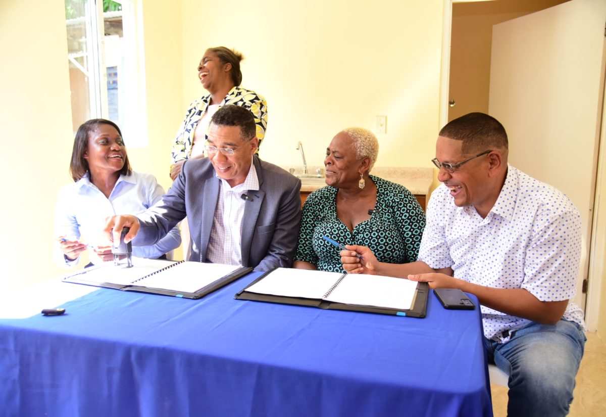 PHOTOS: PM Hands Over Two-Bedroom House to Kingston Central Resident