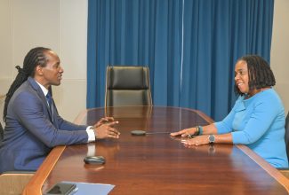 Minister of State in the Ministry of Foreign Affairs and Foreign Trade, Hon. Alando Terrelonge (left), in discussion with Jamaica’s High Commissioner-designate to Trinidad and Tobago, Natalie Campbell-Rodriques, during a courtesy call on the Minister of State, at the Ministry’s Downtown offices, today (September 1). Mrs. Campbell-Rodriques served as a member of the Senate of Jamaica, and as Senior Advisor to the Minister of Foreign Affairs and Foreign Trade, having returned to Jamaica from Rwanda, where she started a real estate company and undertook consultancies with international entities and non-governmental organisations (NGOs) on developmental issues, including youth and gender matters.