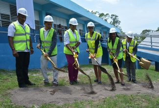 Minister of Education and Youth, Hon. Fayval William (fourth left)), and State Minister, Hon. Marsha Smith (second right), break ground for infrastructure works at Exchange All-Age School in St. Ann on Wednesday (September 6). They are joined by (from left), Principal of the school, Ricardo Moncrieffe; Board Chairman, Gregory Chung; Executive Director of the National Education Trust (NET), Latoya Harris-Ghartey; and Minister without Portfolio in the Ministry of Economic Growth & Job Creation (MEGJC), Senator the Hon. Matthew Samuda.