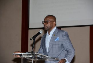 Director of Tourism, Donovan White, addresses the first day of the Jamaica Product Exchange (JAPEX) 2023 at the Montego Bay Convention Centre in Rose Hall, St. James on September 11.