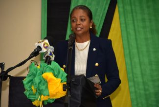 Minister of Legal and Constitutional Affairs, Hon. Marlene Malahoo Forte, delivers the main address at the commissioning ceremony for newly appointed Justices of the Peace (JPs) for the parish of Westmoreland, held at the Sean Lavery Faith Hall in Savanna-La-Mar on Thursday (Sept. 21).