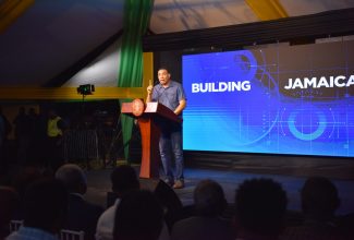 Prime Minister, the Most Hon. Andrew Holness, speaks at a Town Hall meeting at the Harmony Beach Park, Montego Bay, St. James, on August 31.