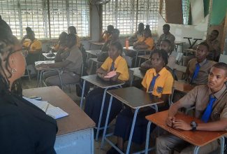 Principal of Marcus Garvey Technical High School in St. Ann, Anniona Jones, addresses students on opening day of the 2023/24 academic year on Monday (September 4).