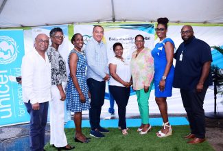 Minister of Health and Wellness, Dr. the Hon. Christopher Tufton (fourth left), with (from left) Parish Manager, St. Elizabeth Health Services, Sean Brissett; Chief Executive Officer (CEO), Black River Hospital, Diana Brown-Miller; Acting Regional Director, Southern Regional Health Authority, Herschel Ismail; Health Specialist, United Nations Children’s Fund (UNICEF), Novia Condell; Assistant Nutritionist, St. Elizabeth Health Department, Tracia Gayle; Director, Health Promotion and Protection, Ministry of Health and Wellness, Dr. Simone Spence; and Consultant Pediatrician, Dr. Aggrey Sajabi. They were attending the hospital’s recent baby friendly certification ceremony.

