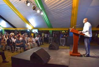 Minister of Tourism, Hon. Edmund Bartlett,  addresses a Townhall Meeting held at the Harmony Beach Park in Montego Bay, St. James, on August 31.   