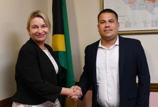 Minister without Portfolio in the Ministry of Economic Growth and Job Creation, Senator the Hon. Matthew Samuda (right), shakes hands with High Commissioner-designate of the Commonwealth of Australia, Her Excellency Sonya Koppe, during a courtesy call at the Ministry’s offices in Kingston on September 12.