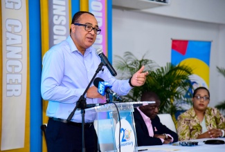  Minister of Health and Wellness, Dr. the Hon. Christopher Tufton, addresses a press conference on Tuesday (October 24) at the Spanish Court Hotel in New Kingston, to announce the addition of five new health conditions under the National Health Fund (NHF) Card Programme.
