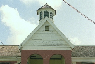 A statue of Paul Bogle that was mounted in front of the old Morant Bay Courthouse in St. Thomas where the events of the 1865 Morant Bay Rebellion took place. The courthouse was destroyed by fire in 2007.