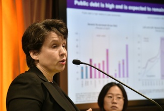 International Monetary Fund (IMF) Deputy Division Chief, Western Hemisphere Department, Anna Ivanova, presents the findings of the October 2023 IMF Regional Economic Outlook Western Hemisphere: Securing Low Inflation and Nurturing Potential Growth report, on Thursday (October 26) at the Bank of Jamaica in Kingston.