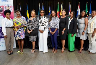 Newly elected President of the Women in Maritime Association Caribbean (WiMAC), Dr. Evette Smith Johnson (second left) is joined by members of the Governing Council of the Association. From left are Immediate Past President, Tamara Lowe-James (Dominica); Vice President (VP), Public Relations and Marketing, Tricia King (St. Kitts and Nevis); Director, Finance, Ilaisa Lila (Suriname); VP Research and Development, Suzette Balkaran (Trinidad and Tobago); VP Women and Development, Katina Benn (Guyana); VP Membership and Administration, Abigail Bryan (Jamaica); Member-at-large, Calita Benjamin (Dominica); and Director of Corporate Affairs, Racquel Forbes (Jamaica).  The Governing Council was elected at the WiMAC Regional Conference and sixth Annual General Meeting held recently at the Ocean Coral Spring Resort in Trelawny.

 