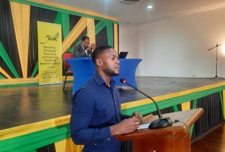Deputy Mayor of Montego Bay, Councillor Richard Vernon, addresses gthe Jamaica Cultural Development Commission’s (JCDC) heritage lecture on the history of St. James at the Montego Bay Cultural Centre on October 19.

