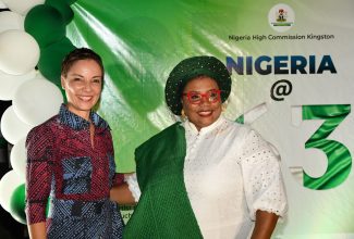 Minister of Foreign Affairs and Foreign Trade, Senator the Hon. Kamina Johnson Smith (left), shares a moment with High Commissioner for the Republic of Nigeria to Jamaica, Her Excellency Dr. Maureen Tamuno, at a reception in celebration of the 63rd Nigeria National Day, held at the High Commissioner's Residence in Kingston on September 30.