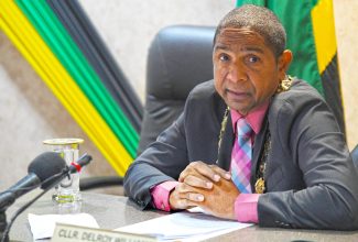 Mayor of Kingston, Senator Councillor Delroy Williams, addressing Tuesday’s (October 10) monthly meeting of the Kingston and St. Andrew Municipal Corporation (KSAMC) at the council’s office in downtown Kingston.