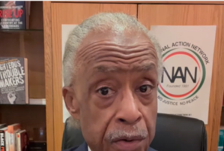 American civil rights activist, Rev. Al Sharpton, speaks via a video presentation at a memorial service for Paul Bogle and the Morant Bay War on Tuesday (October 24). The event was held at Colonel Cove in Morant Bay.

