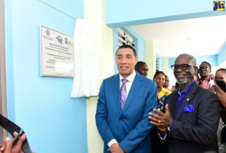 Prime Minister, the Most Hon. Andrew Holness (left) and Local Government and Community Development Minister, Hon. Desmond McKenzie, at the official opening of the new male ward at the Westmoreland Infirmary.