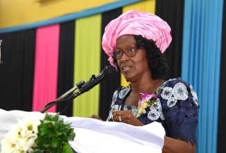 Chair, National Child Month Committee (NCMC), Dr. Pauline Mullings, addressing the NCMC’s annual Youth Academic Achievement Awards ceremony, held recently at the Caenwood Centre in Kingston


