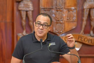 Minister of Health and Wellness, Dr. the Hon. Christopher Tufton, makes a point during Wednesday’s (October 4) post-Cabinet press briefing at Jamaica House.

